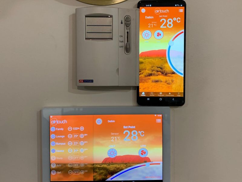 AirTouch wall touchscreen and phone app showing a 28 degree set point